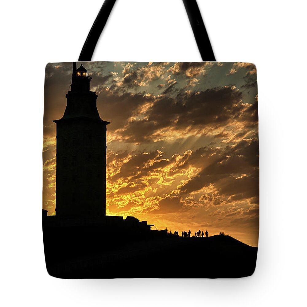 Sundown Tote Bag featuring the photograph The Tower of Hercules by Micah Offman