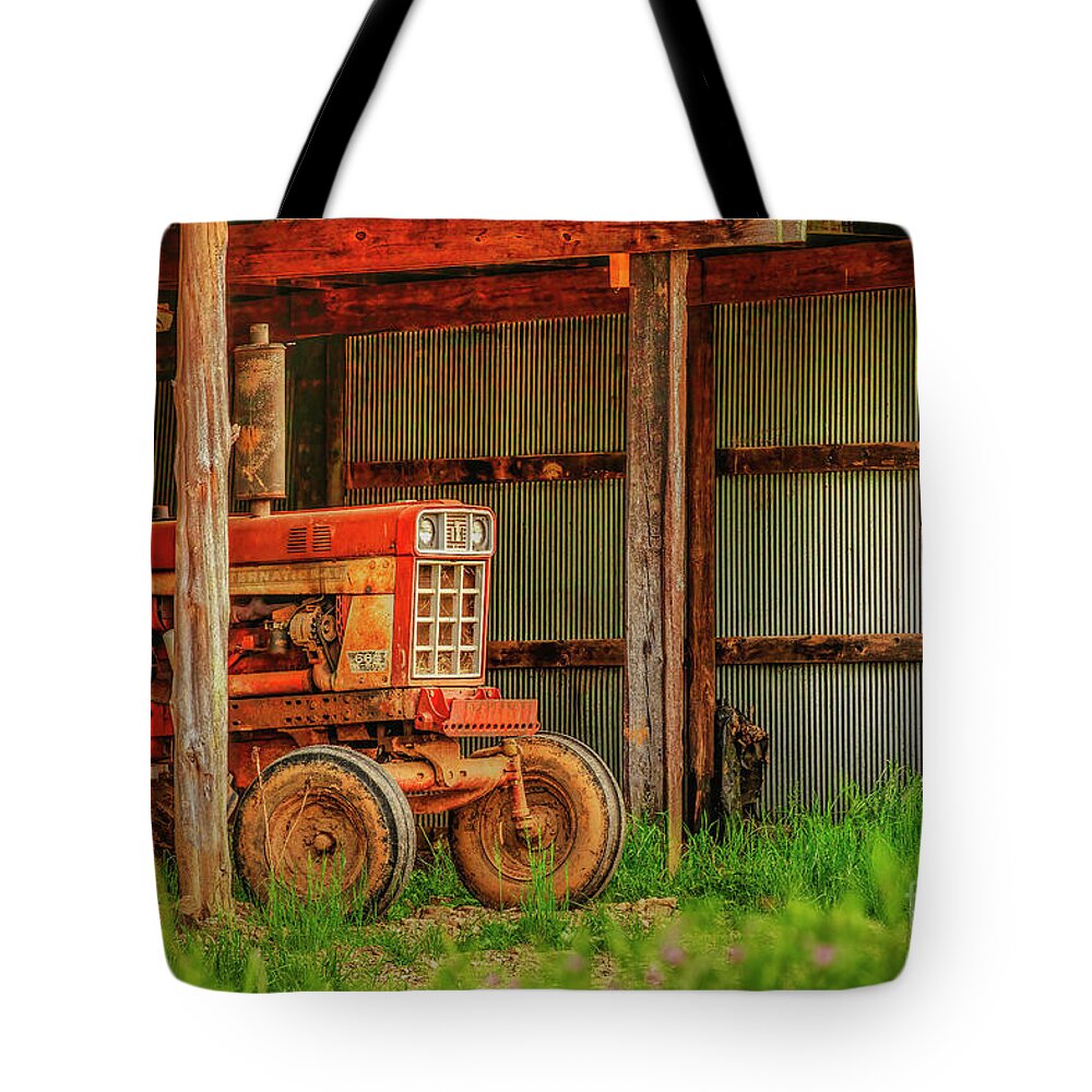 Tractor Tote Bag featuring the photograph The Red Tractor by Shelia Hunt