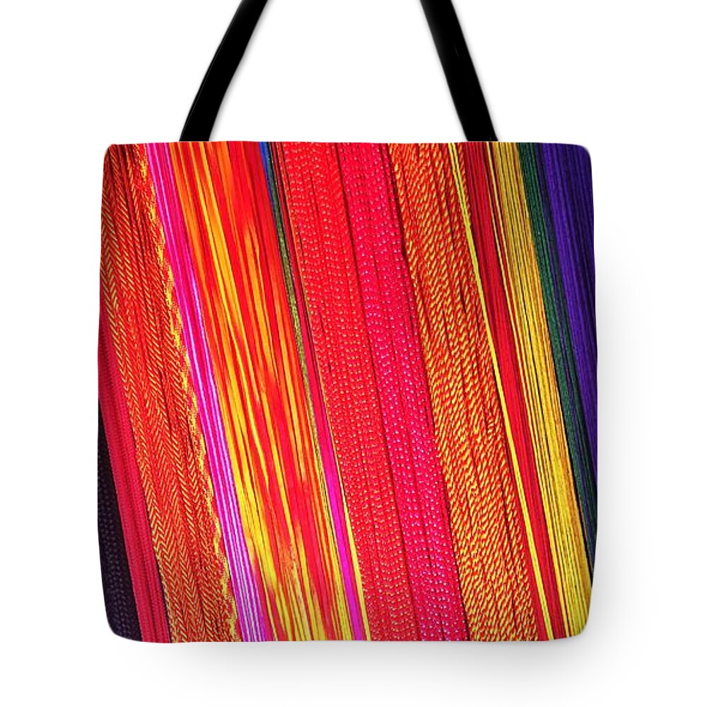 Decorative Threads Tote Bag featuring the photograph ThReady by Jarek Filipowicz