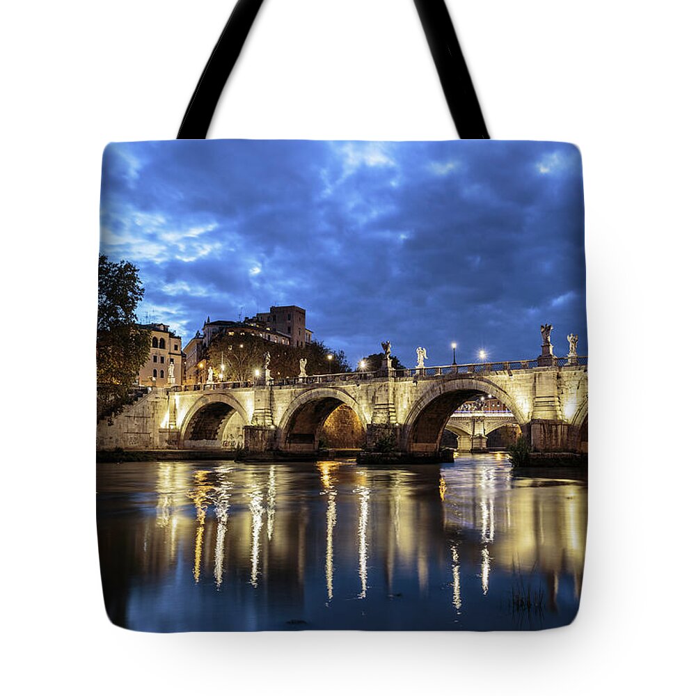 Ponte Santangelo Tote Bag featuring the photograph Tiber River at sunset in Rome, Italy by Fabiano Di Paolo