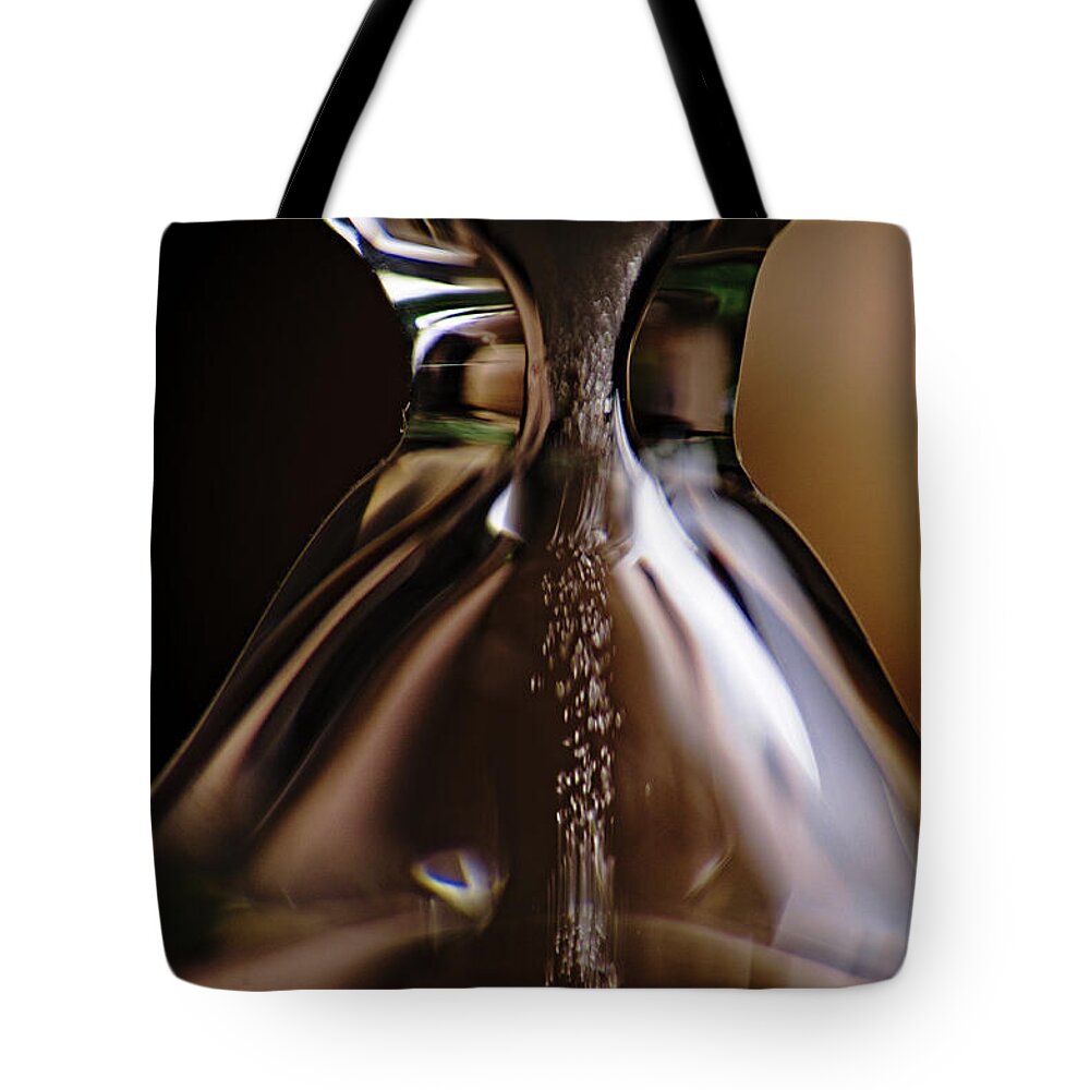 Sand Glass Tote Bag featuring the photograph Time in a Bottle by Angelo DeVal