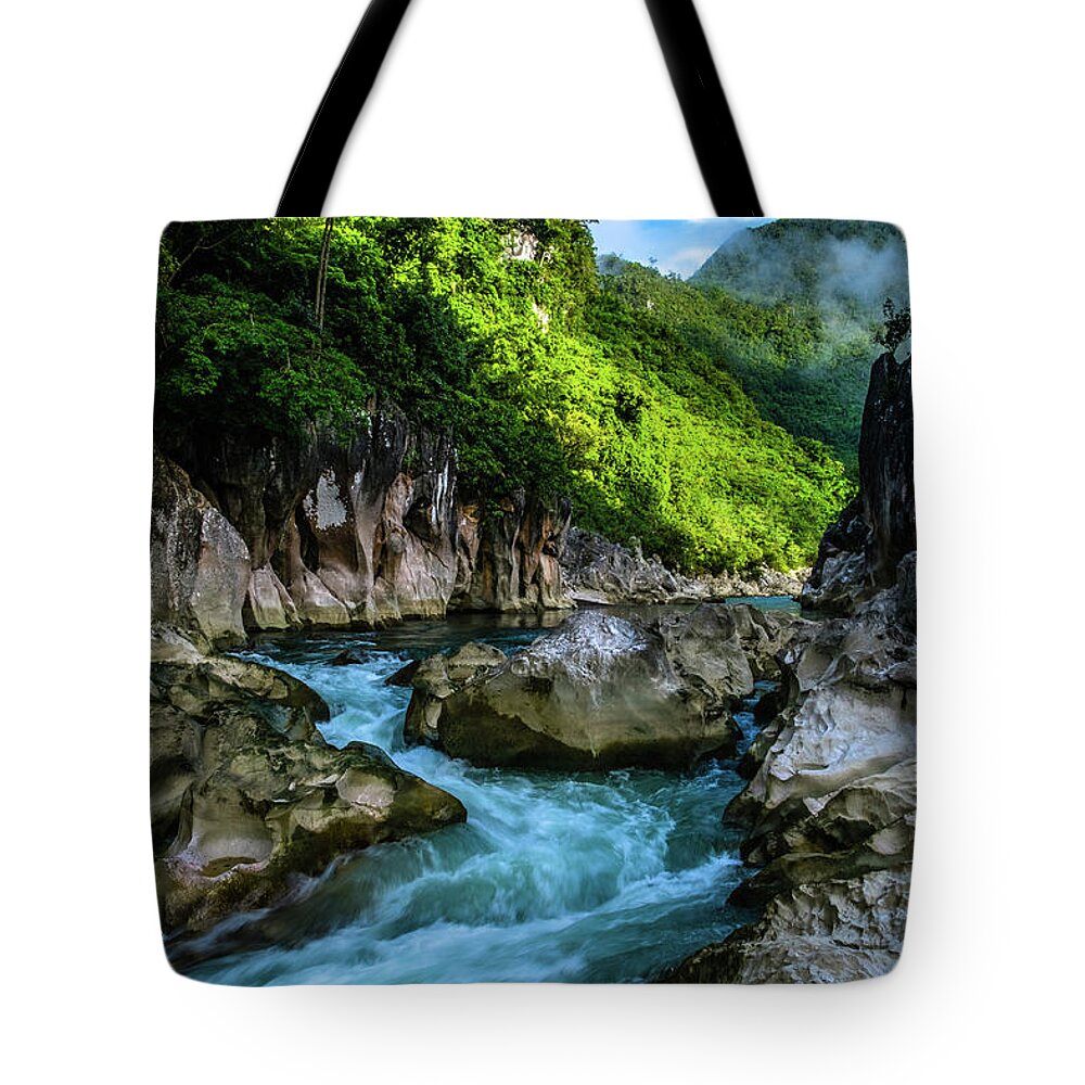 Rizal Tote Bag featuring the photograph Tinipak River in Tanay by Arj Munoz