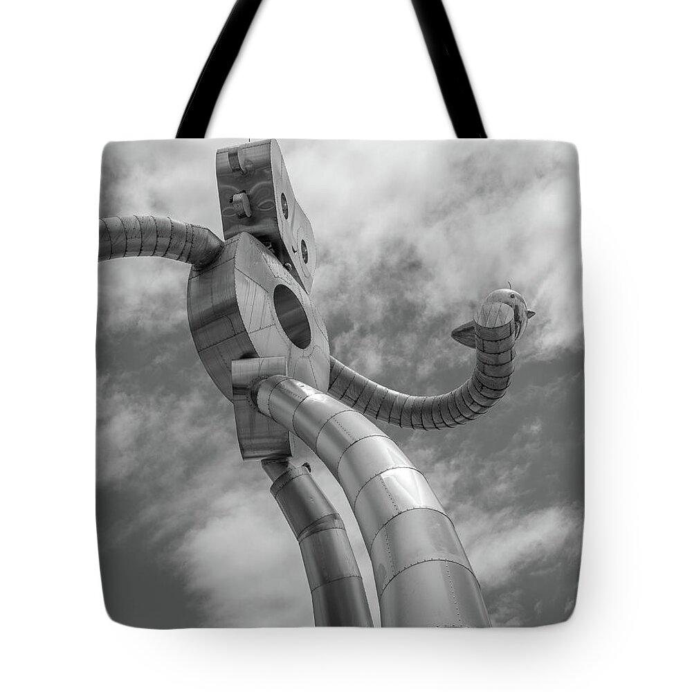 Traveling Man Tote Bag featuring the photograph Traveling Man Deep Ellum Dallas Texas Black and White by Edward Fielding