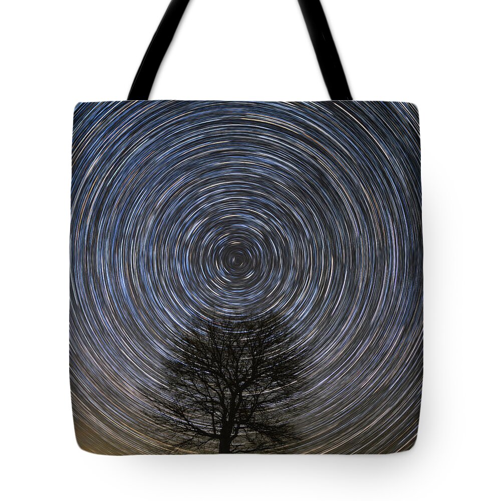 Star Trails Tote Bag featuring the photograph Tree Topper by Chuck Rasco Photography