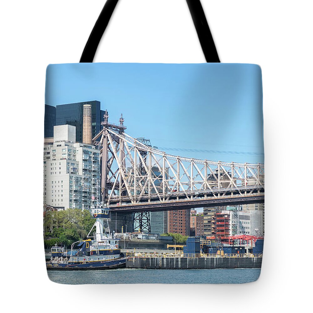 East River Tote Bag featuring the photograph Tug and Barge Under Bridge by Cate Franklyn