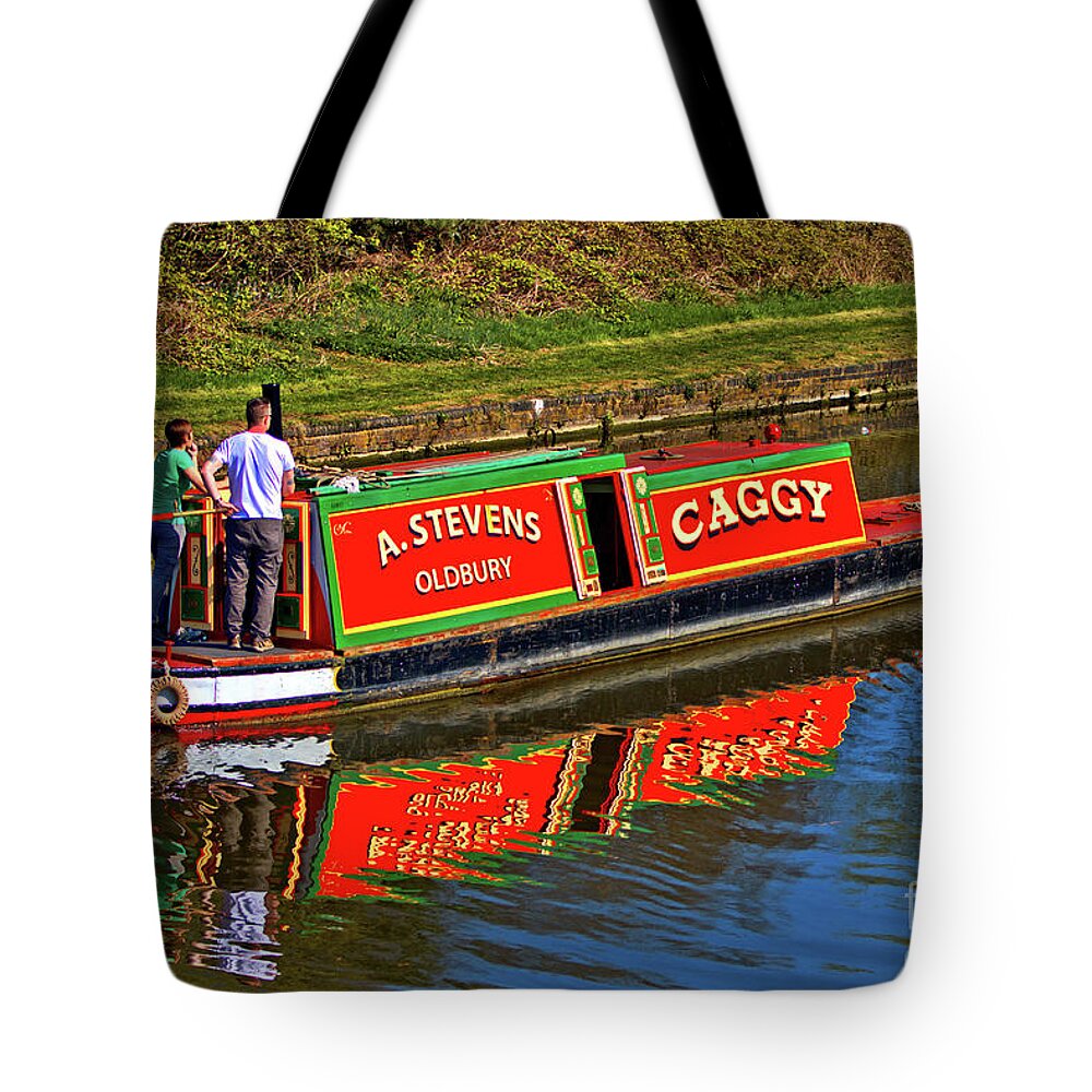 Machinery Tote Bag featuring the photograph Tug Boat Caggy by Stephen Melia