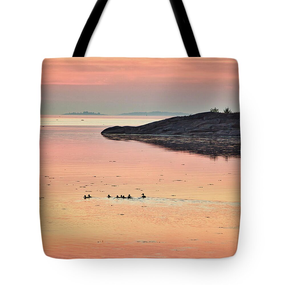 Twilight Tote Bag featuring the photograph Twilight at the seaside by Maria Dimitrova