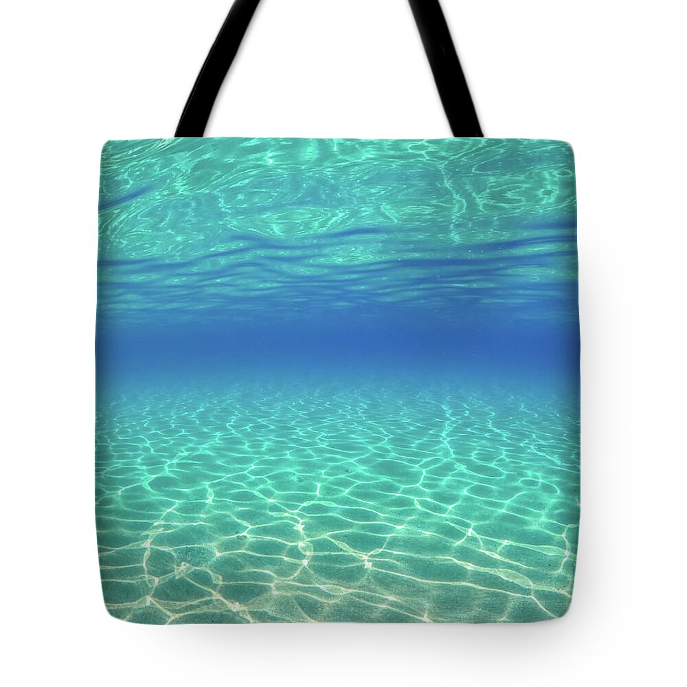 Underwater Tote Bag featuring the photograph Underwater View of Crystal Clear Waters in Greece by Alexios Ntounas