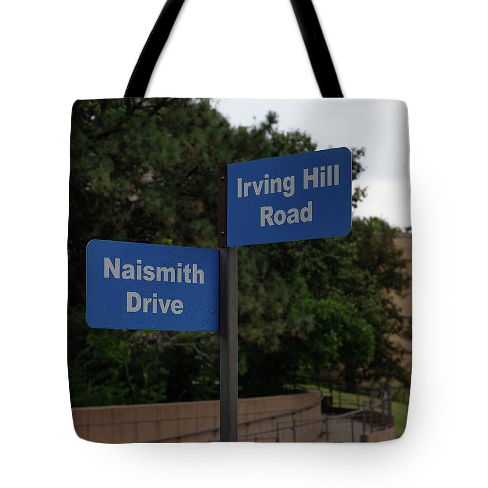 Kansas Jayhawks Tote Bag featuring the photograph Naismith Drive street sign at University of Kansas by Eldon McGraw