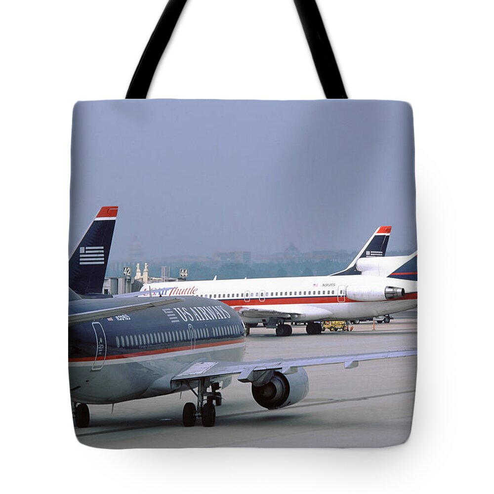 Us Airways Tote Bag featuring the photograph US Airways Boeing 737s at Washington Reagan Airport by Erik Simonsen