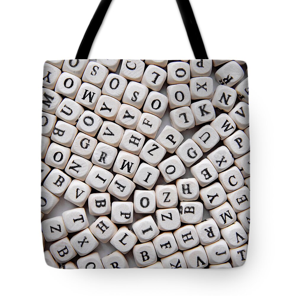 Different Tote Bag featuring the photograph Various Letters Background by Severija Kirilovaite