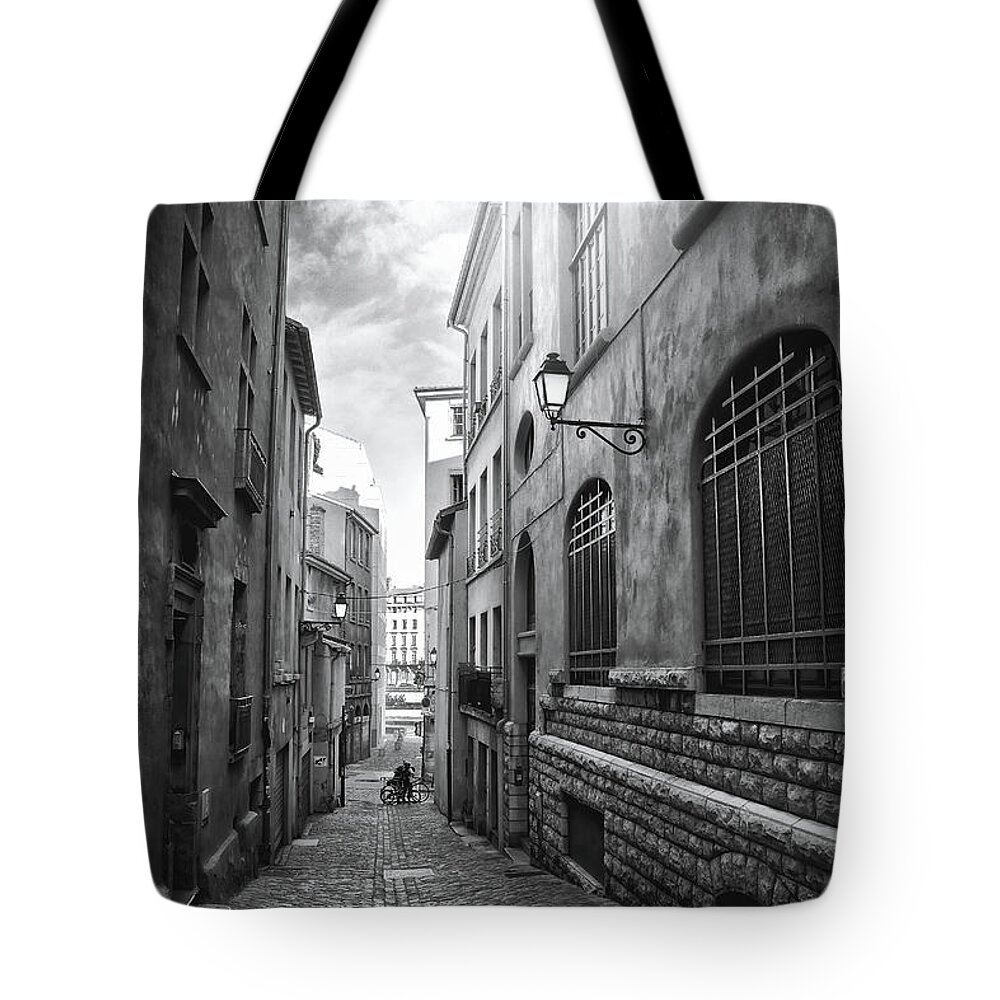 Lyon Tote Bag featuring the photograph Vieux Lyon France Rue Vieil Renverse Black and White by Carol Japp