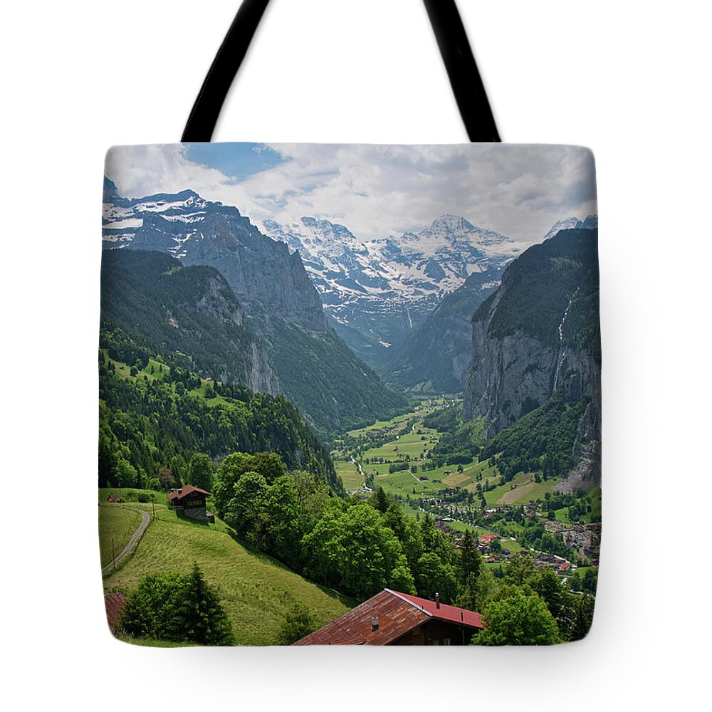 Lauterbrunnen Tote Bag featuring the photograph View of the Lauterbrunnen Valley from Wengen by Matthew DeGrushe