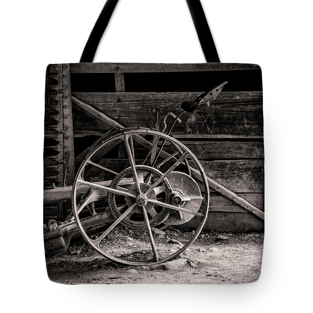 Wheel Tote Bag featuring the photograph Vintage Farm Machine by Ginger Stein