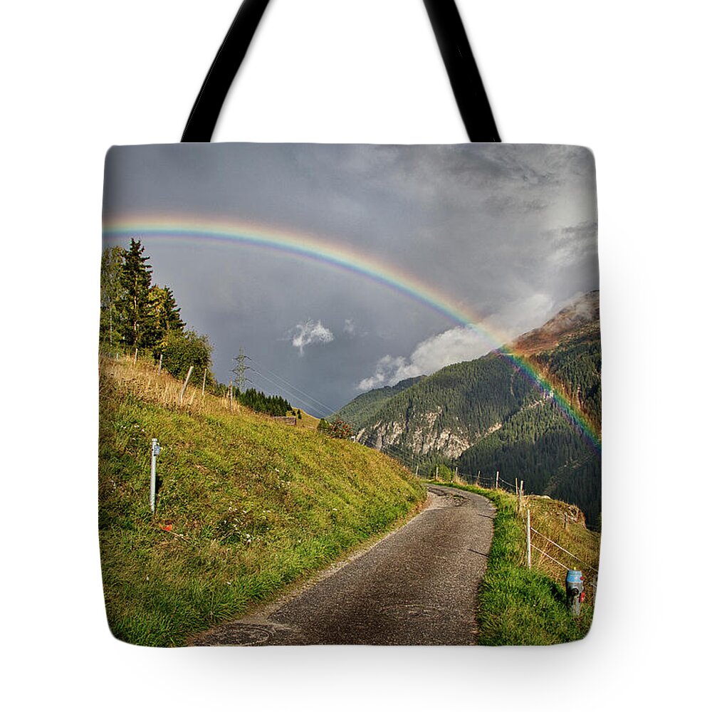 Rainbow Tote Bag featuring the photograph Walk under the Rainbow by Thomas Nay