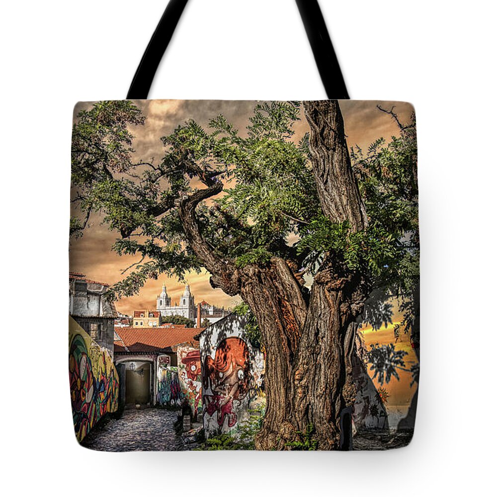 Lisbon Tote Bag featuring the photograph Walking in history's footsteps by Micah Offman