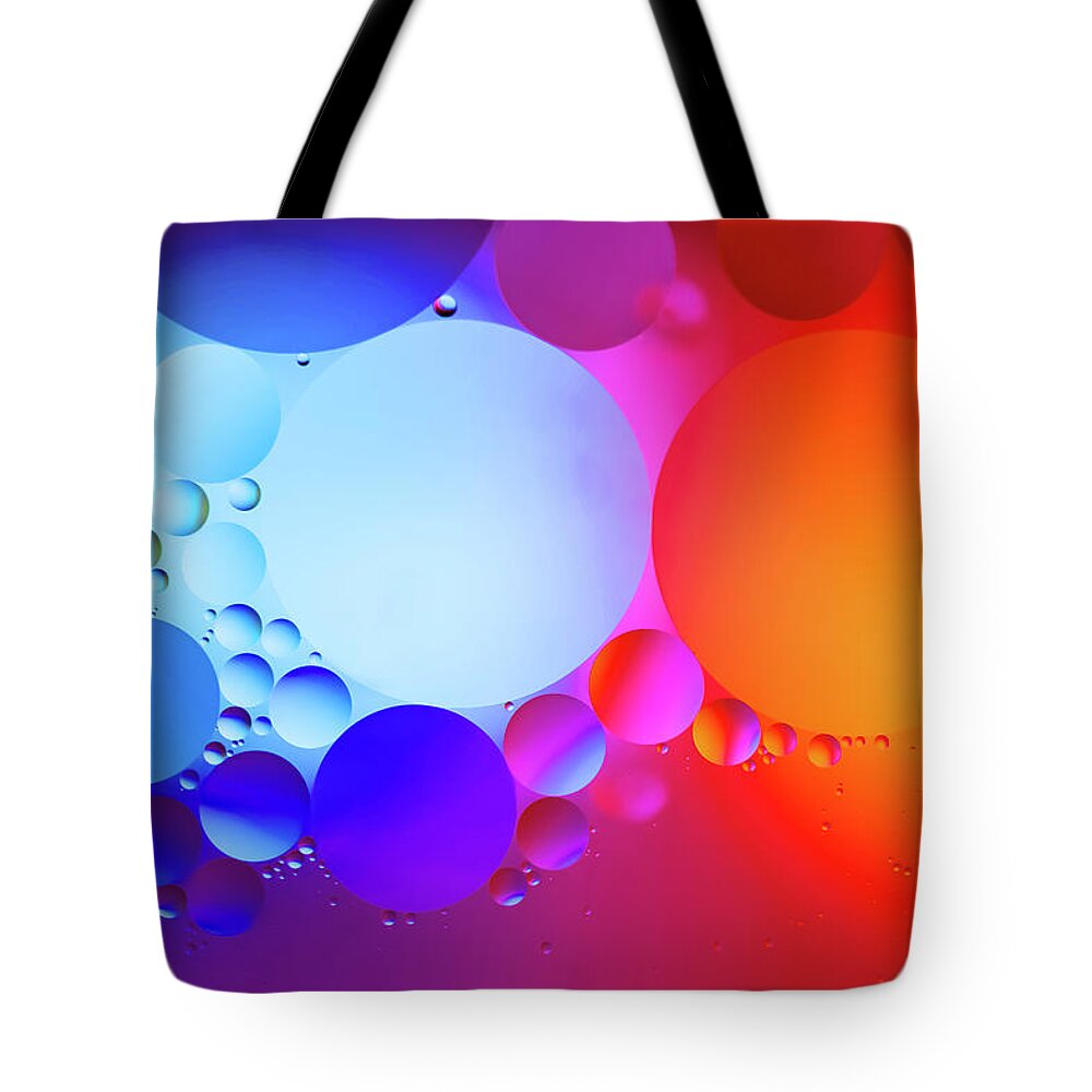 Abstract Tote Bag featuring the photograph Water and oil no. 1 by Silvia Marcoschamer