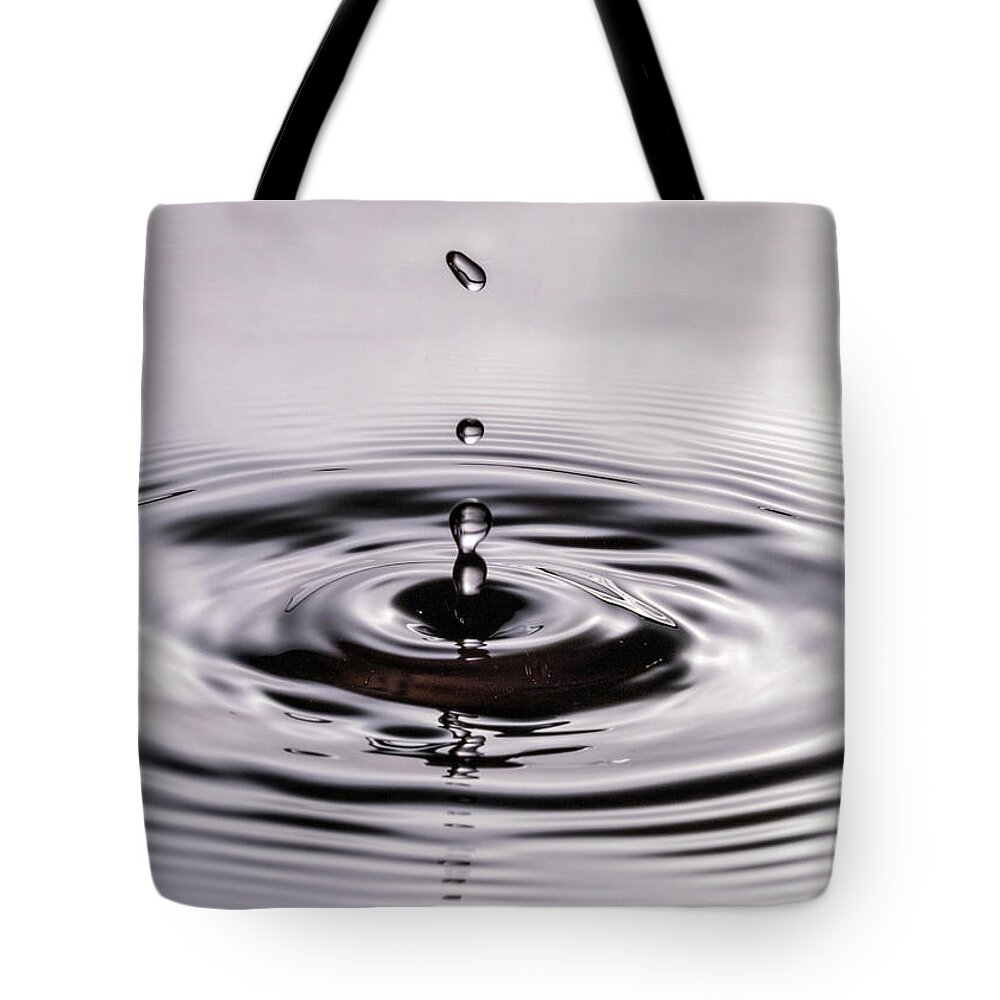 Close Up Tote Bag featuring the photograph Water Drops Splash Down by Amelia Pearn