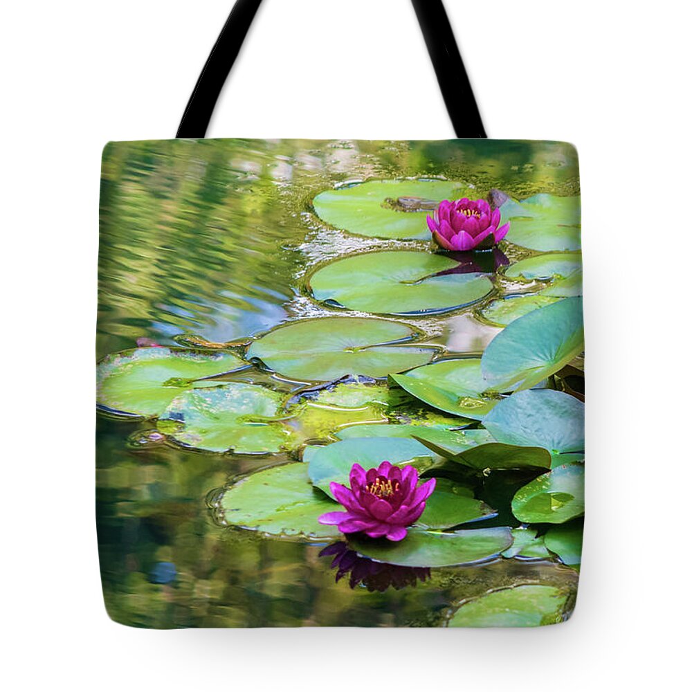 Waterlilies Tote Bag featuring the photograph Waterlilies at Gibbs Gardens by Mary Ann Artz