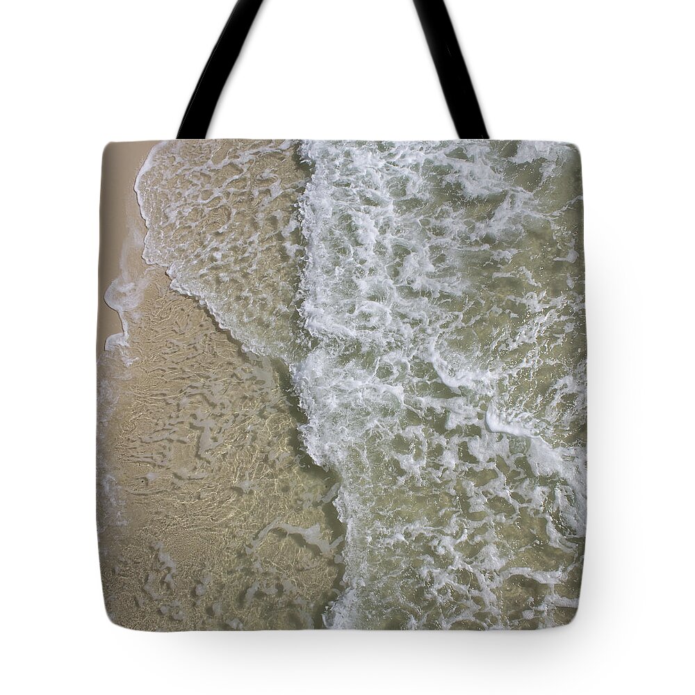 Wave Fissure Tote Bag featuring the photograph Wave Fissure by Dylan Punke