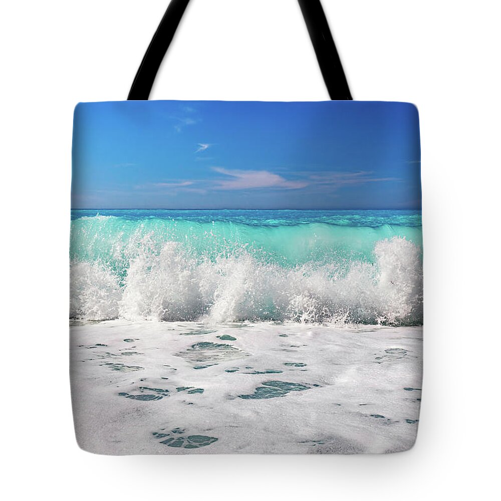 Sea Tote Bag featuring the photograph Waves crashing Ionian sea in Greece. by Michal Bednarek