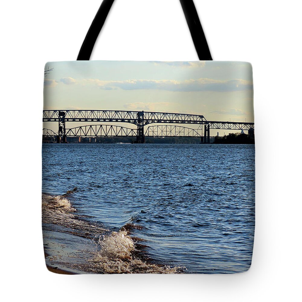 River Tote Bag featuring the photograph Waves Lapping the Shore of the Delaware River Near Betsy Ross and Delair Memorial Railroad Bridges by Linda Stern