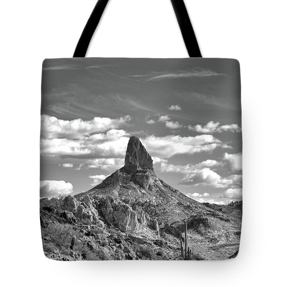 Weavers Needle Tote Bag featuring the photograph Weavers Needle in Black and White by Bob Falcone