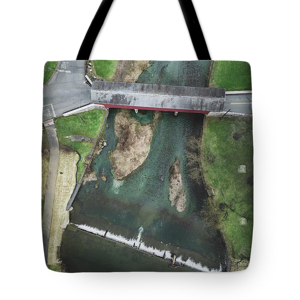 Above Tote Bag featuring the photograph Wehrs Dam and Covered Bridge March Aerial by Jason Fink