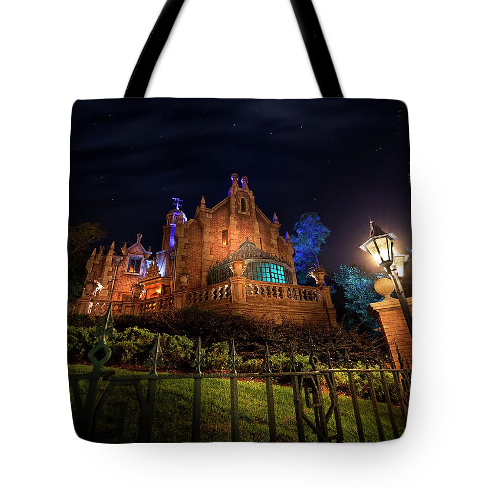 Haunted Mansion Night Tote Bag featuring the photograph When Ghosts Follow You Home by Mark Andrew Thomas