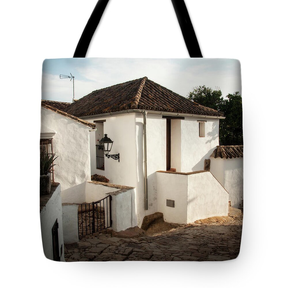 Spain Tote Bag featuring the photograph White washed village of Andalucia by Naomi Maya