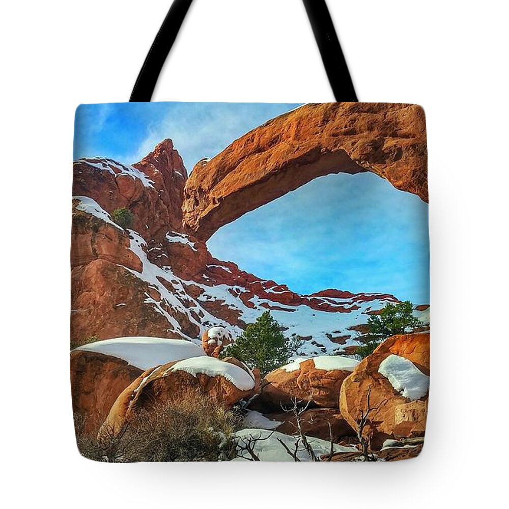 Arches National Park Tote Bag featuring the photograph Windows at Arches by Katie Dobies
