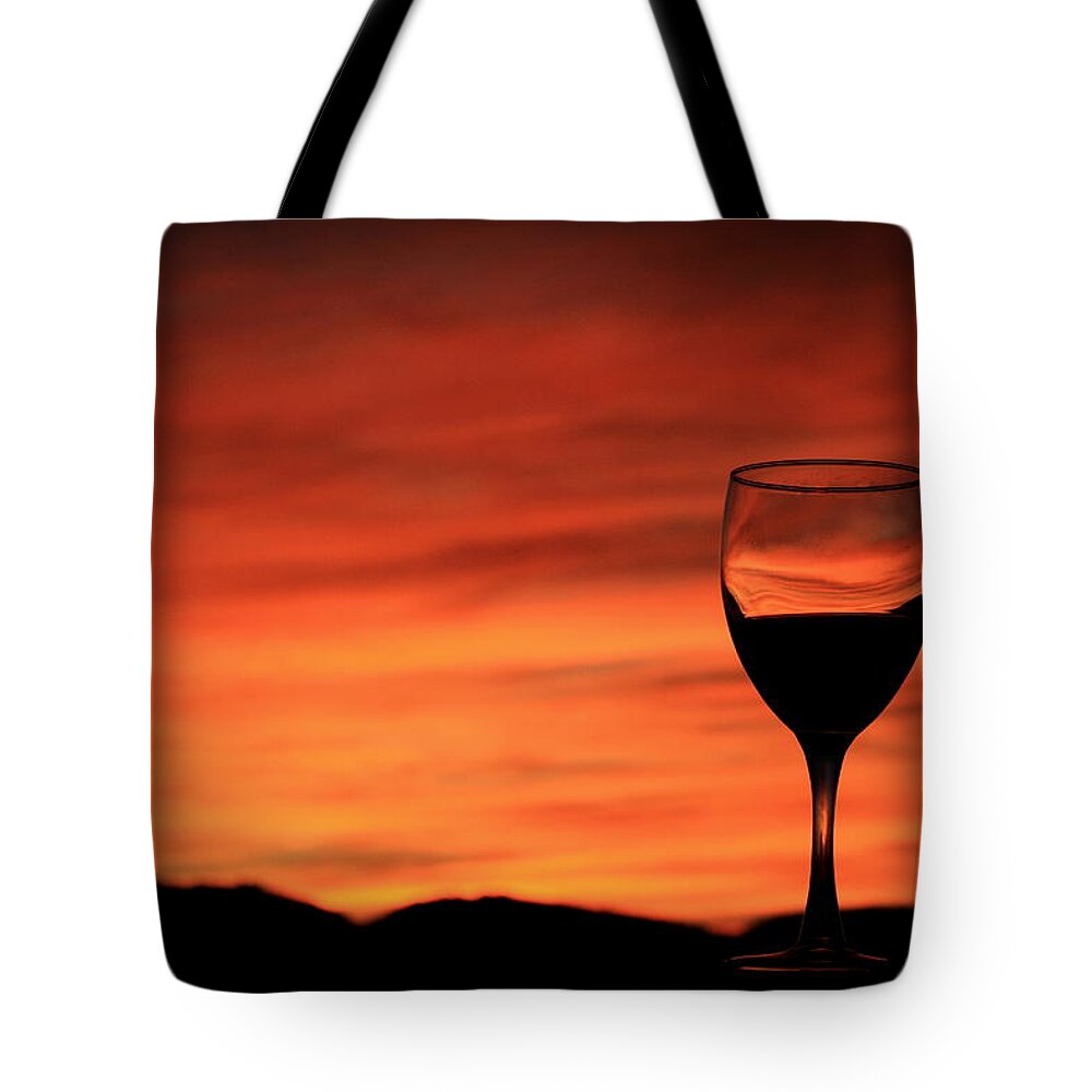 Westwing Sundowner Tote Bag featuring the photograph Westwing Sundowner by Gene Taylor