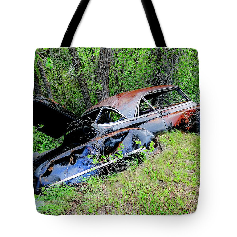 Wreaked Vintage Car Tote Bag featuring the photograph Wreck in the Rain by Neil Pankler