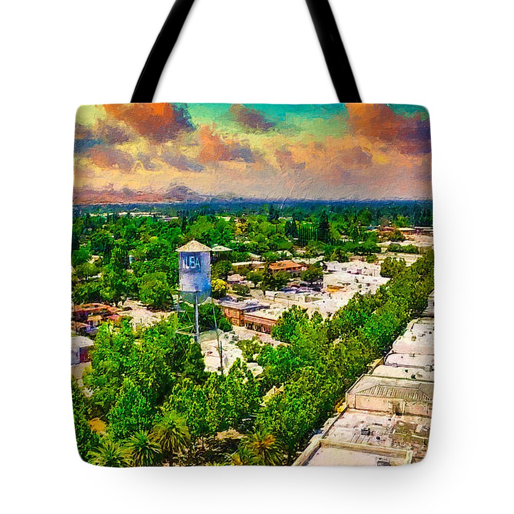Yuba City Tote Bag featuring the digital art Yuba City and the water tower, California - digital painting by Nicko Prints