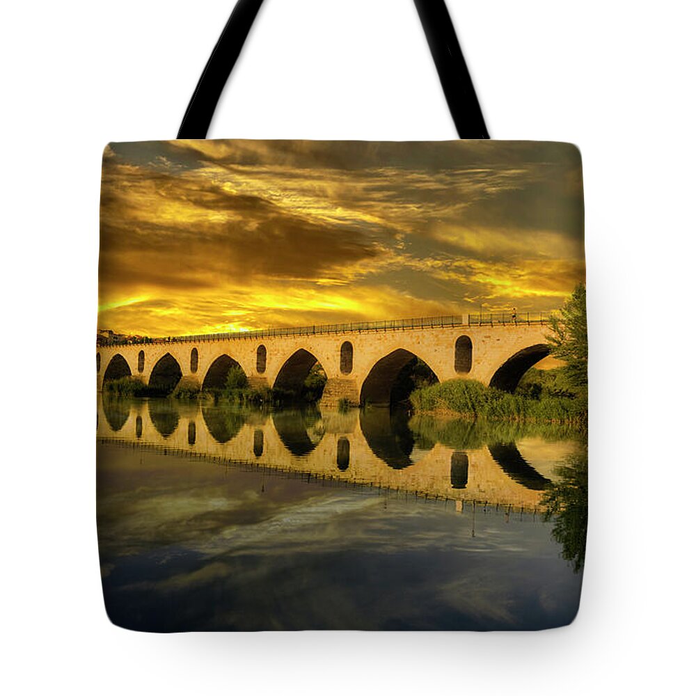 Sunset Tote Bag featuring the photograph Zamora's Roman Bridge by Micah Offman