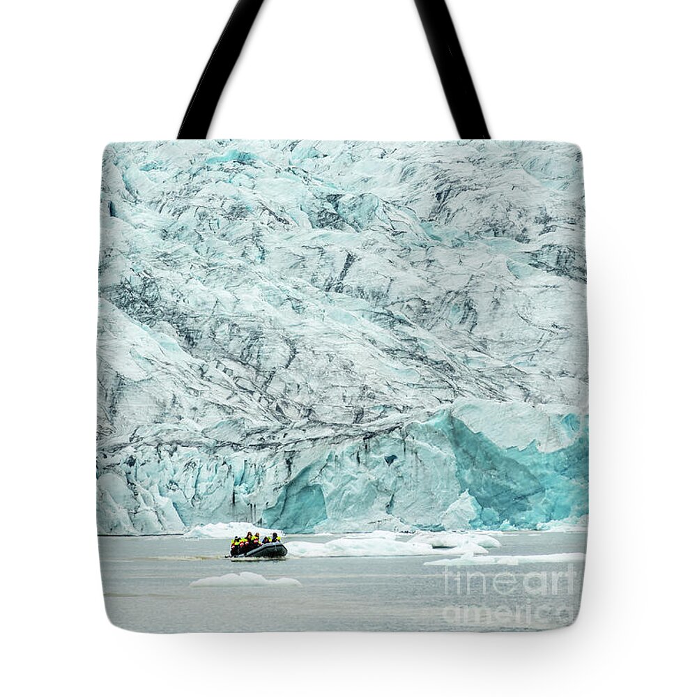 Iceland Tote Bag featuring the photograph Zodiac boat in glacier lagoon, Iceland by Delphimages Photo Creations