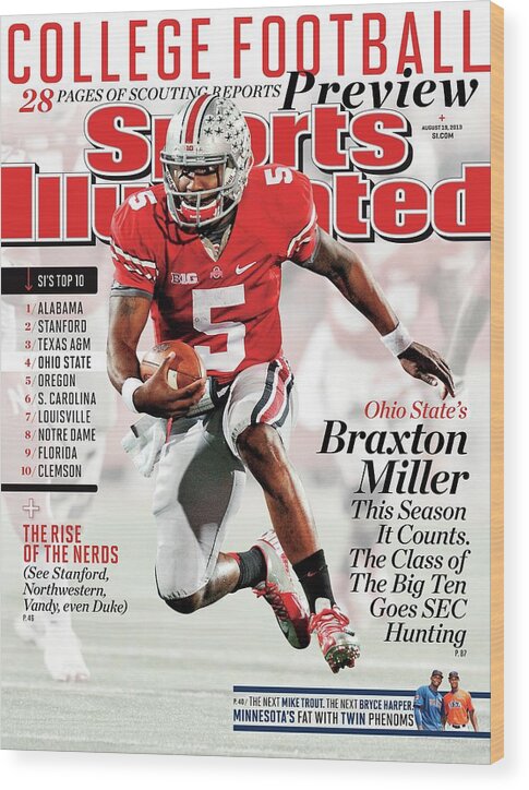 Magazine Cover Wood Print featuring the photograph 2013 College Football Preview Issue Sports Illustrated Cover by Sports Illustrated