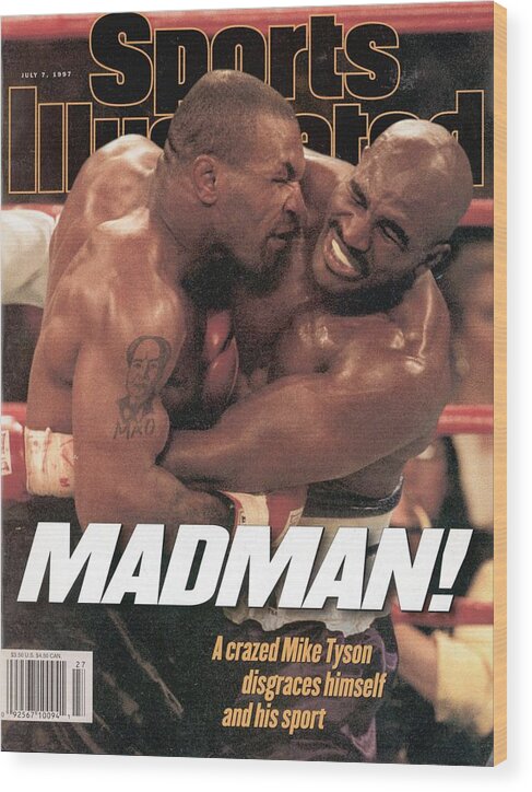 Magazine Cover Wood Print featuring the photograph Mike Tyson Vs Evander Holyfield, 1997 Wba Heavyweight Title Sports Illustrated Cover by Sports Illustrated