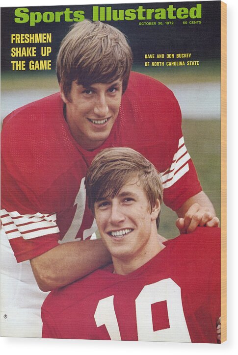 Magazine Cover Wood Print featuring the photograph North Carolina State University Don And Dave Buckey Sports Illustrated Cover by Sports Illustrated