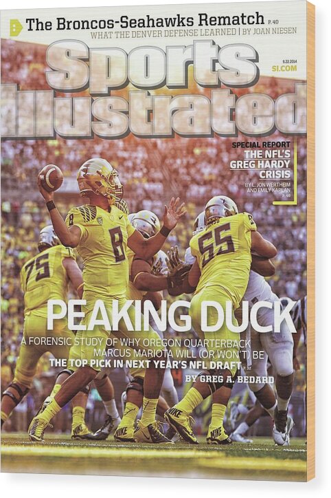 Michigan State University Wood Print featuring the photograph Peaking Duck Marcus Mariota Sports Illustrated Cover by Sports Illustrated