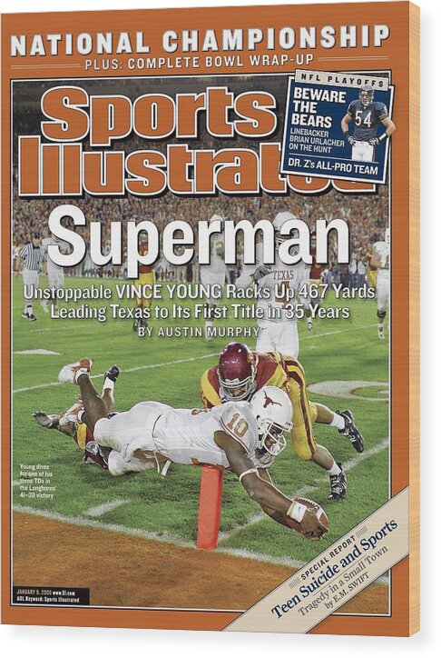 Magazine Cover Wood Print featuring the photograph Texas Qb Vince Young, 2006 Rose Bowl Sports Illustrated Cover by Sports Illustrated