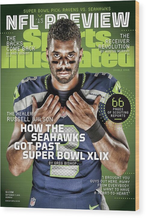 Magazine Cover Wood Print featuring the photograph The Healer Russell Wilson 2015 Nfl Football Preview Issue Sports Illustrated Cover by Sports Illustrated