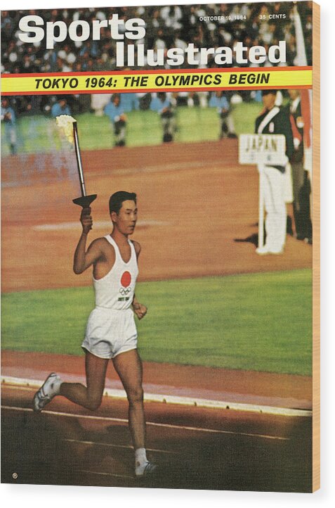 Magazine Cover Wood Print featuring the photograph Yoshinori Sakai, 1964 Summer Olympics Sports Illustrated Cover by Sports Illustrated