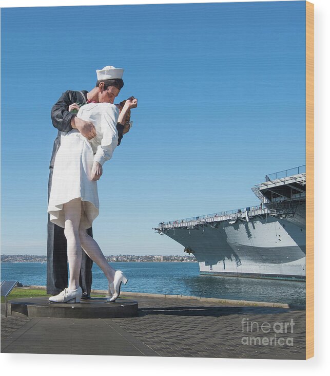 Embracing Peace Sculpture Wood Print featuring the photograph Embracing Peace Sculpture and USS Midway Aircraft Carrier by David Levin