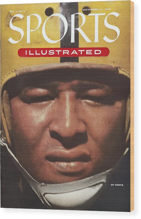 1950-1959 Wood Print featuring the photograph University Of Iowa Calvin Jones Sports Illustrated Cover by Sports Illustrated
