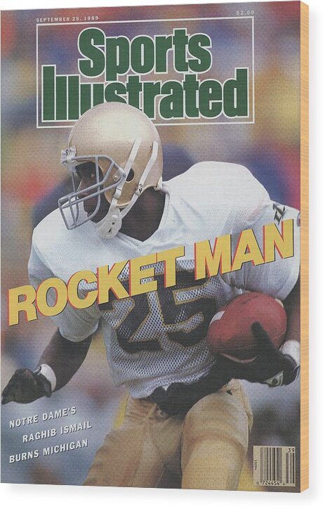 1980-1989 Wood Print featuring the photograph University Of Notre Dame Rocket Ismail Sports Illustrated Cover by Sports Illustrated