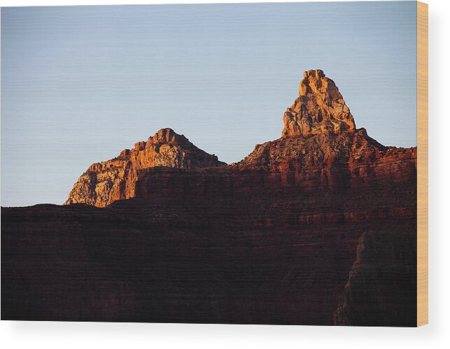 Scenics Wood Print featuring the photograph A Sandstone Tower Lit By The Setting #1 by Kyle Sparks