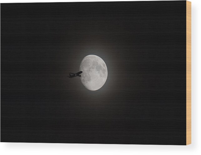 Moon Wood Print featuring the digital art Airliner passing in front of the Moon #1 by Gary Eason