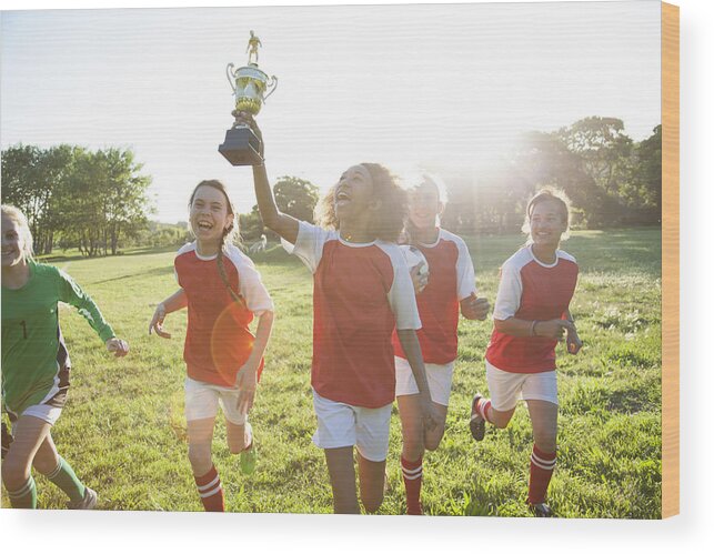 Soccer Uniform Wood Print featuring the photograph Girls soccer team celebrating #1 by Alistair Berg