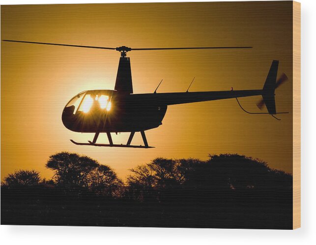 Helicopter Wood Print featuring the photograph R44 Sunset #1 by Paul Job